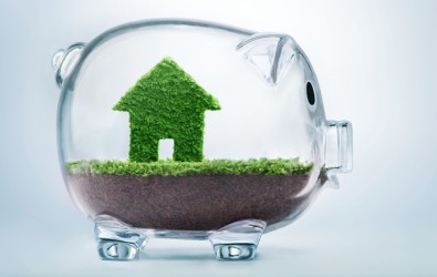 Saving to buy a house or home savings concept