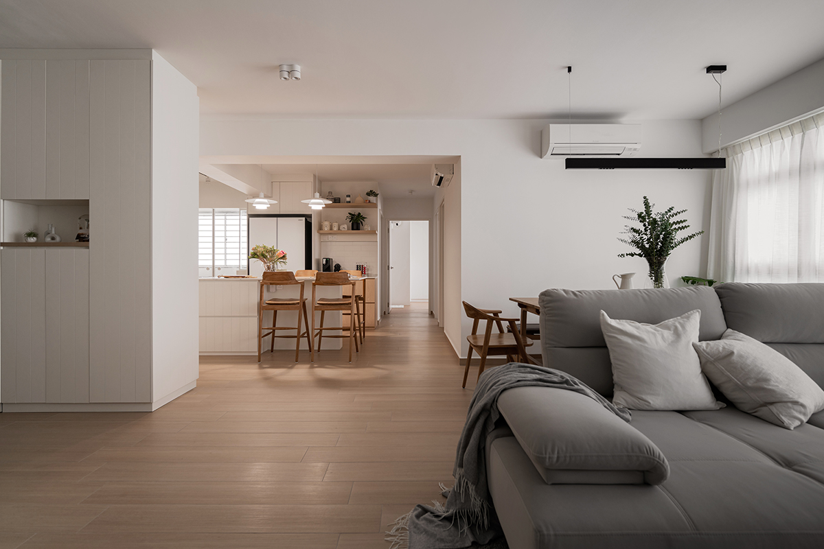 squarerooms ovon design home makeover 3 room hdb renovation interior design scandinavian cosy cute aesthetic apartment look bedok south road living dining room sofa open concept space kitchen island