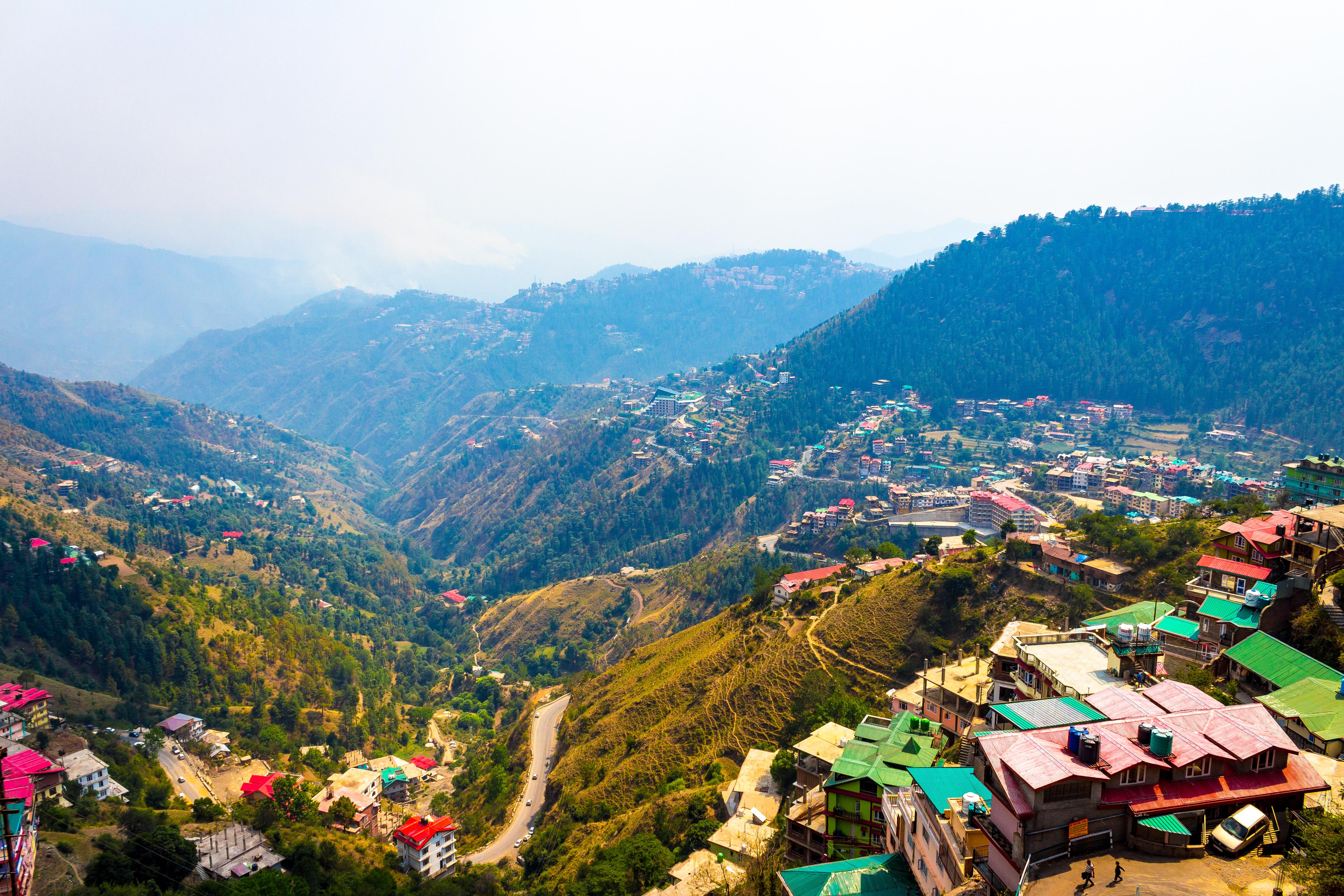 View of small houses on hills in a rural area.
